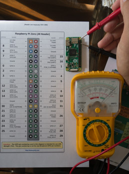 Raspberry Pi Zero being tested with a multi meter
